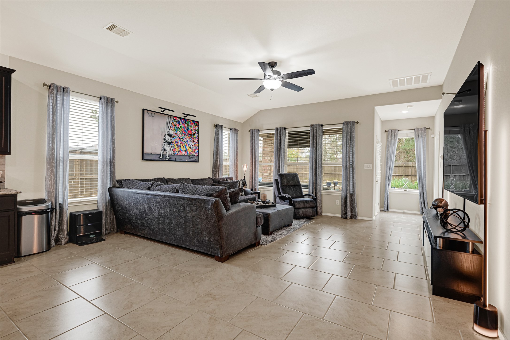 24303 Ravenna Landing Loop Spring, TX 77389 - Photo 14 of 46 a living room with furniture and a flat screen tv