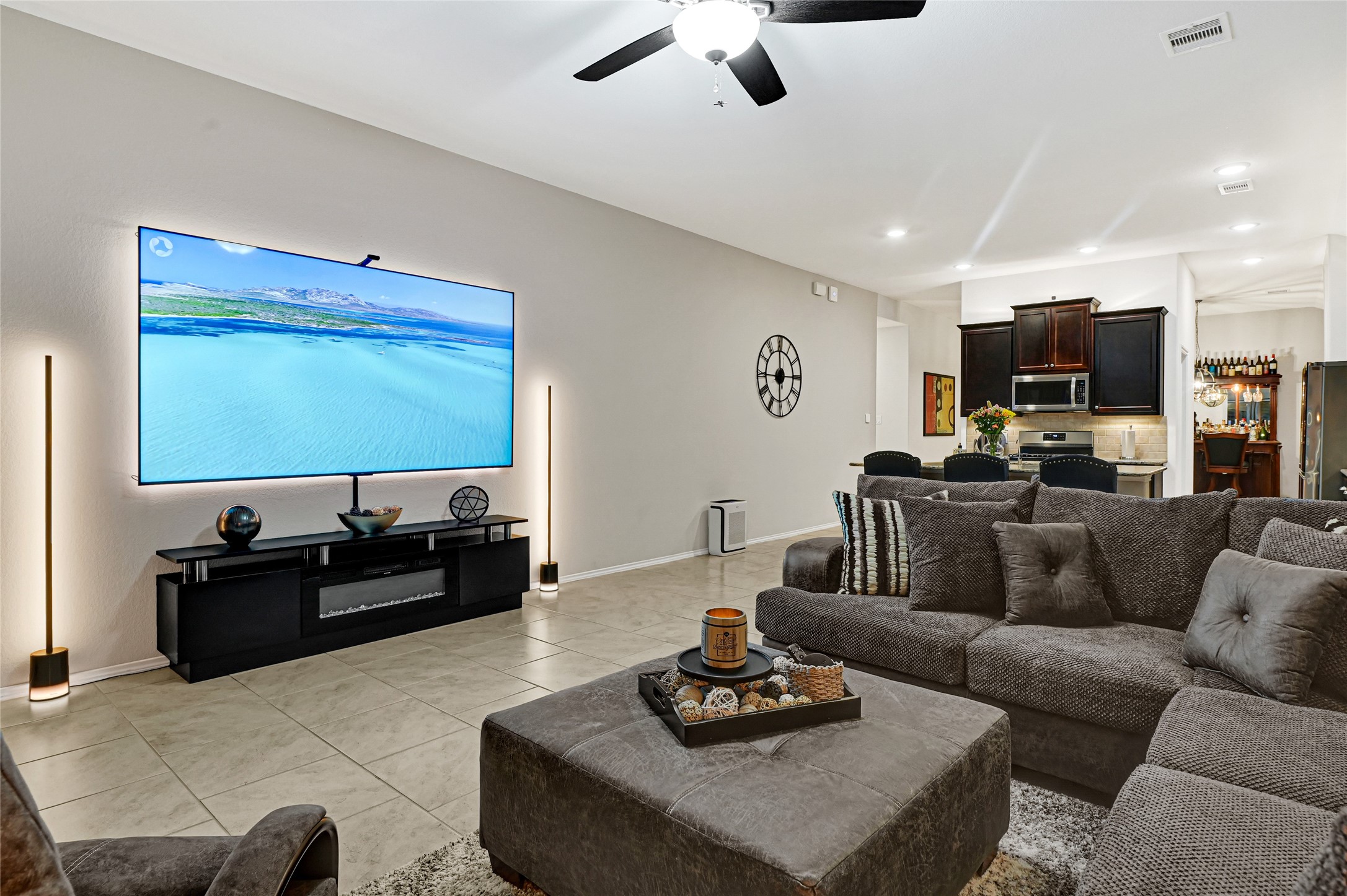 24303 Ravenna Landing Loop Spring, TX 77389 - Photo 17 of 46 a living room with furniture and a flat screen tv