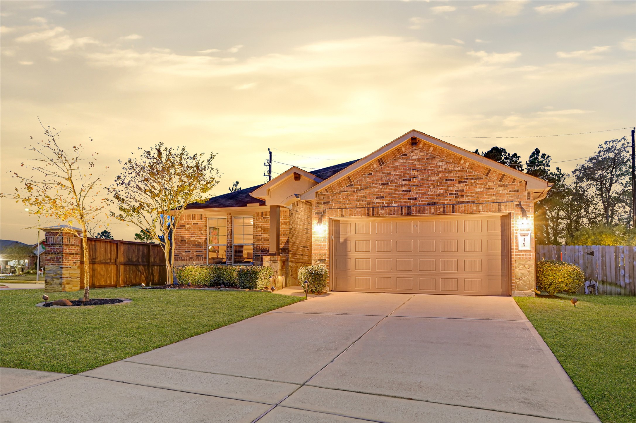 24303 Ravenna Landing Loop Spring, TX 77389 - Photo 3 of 46 a front view of a house with a yard and garage