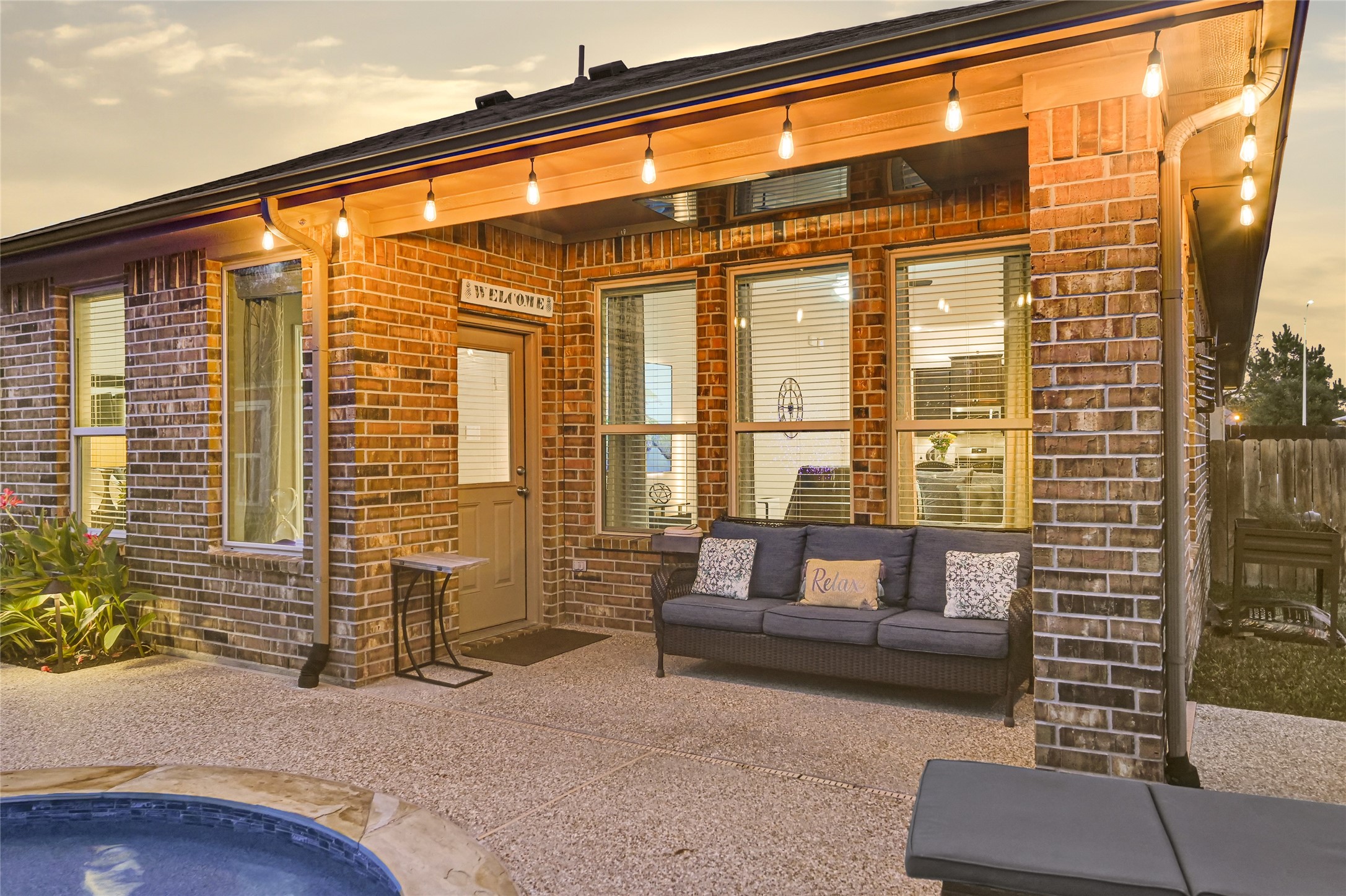 24303 Ravenna Landing Loop Spring, TX 77389 - Photo 35 of 46 a outdoor living space with patio furniture and a ceiling fan