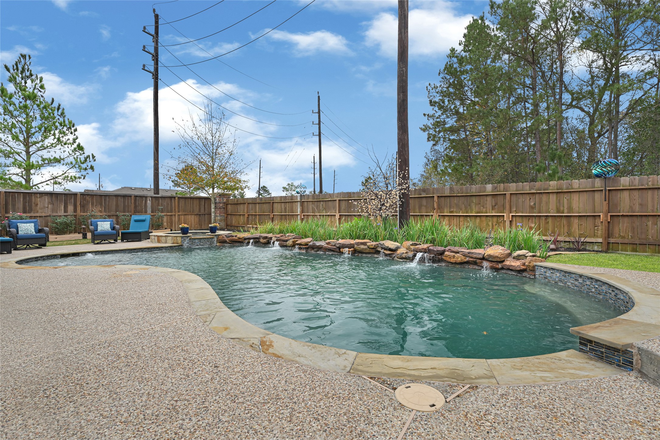 24303 Ravenna Landing Loop Spring, TX 77389 - Photo 42 of 46 a view of a swimming pool with a sitting area