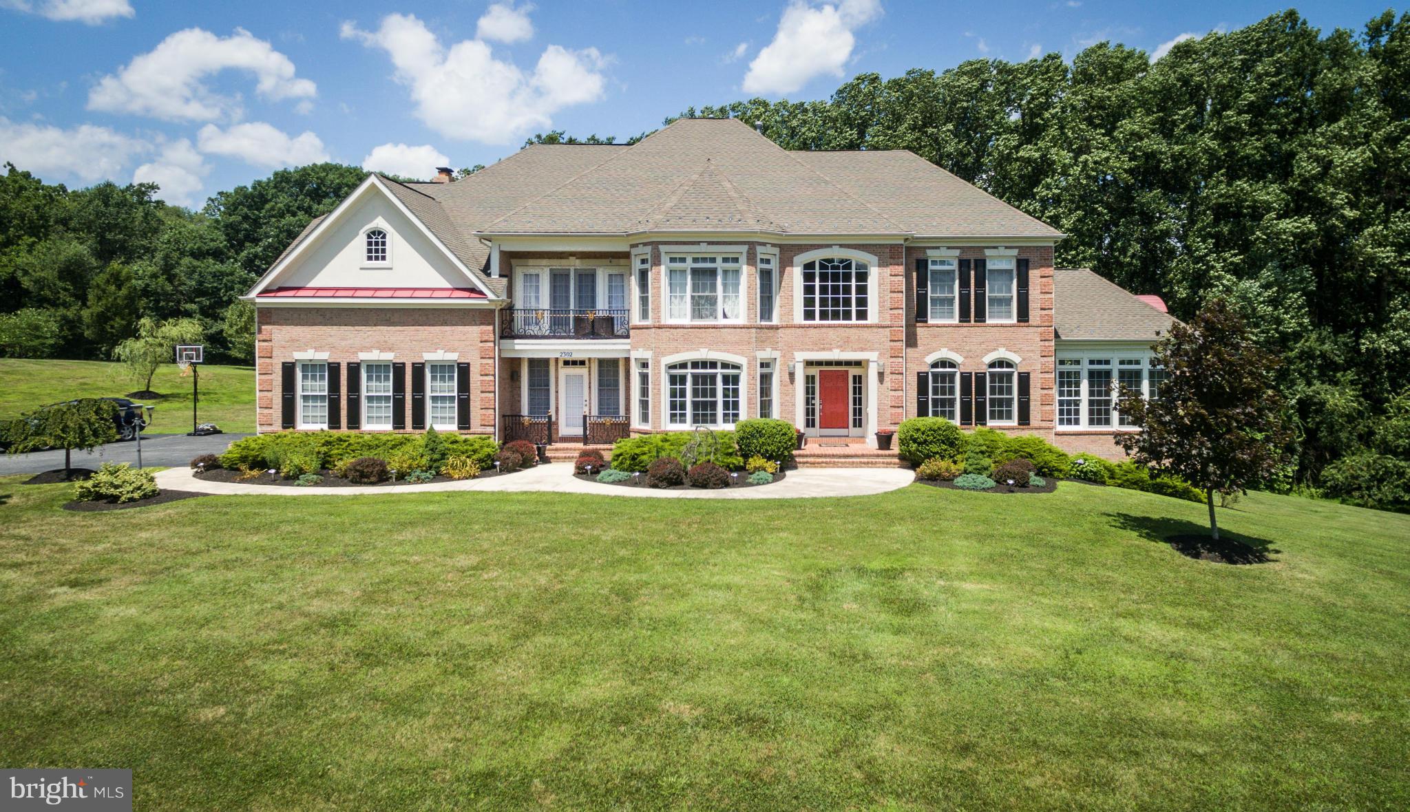 2302 Parlor Court Fallston, MD 21047 - Photo 1 of 30 a front view of a house with a yard