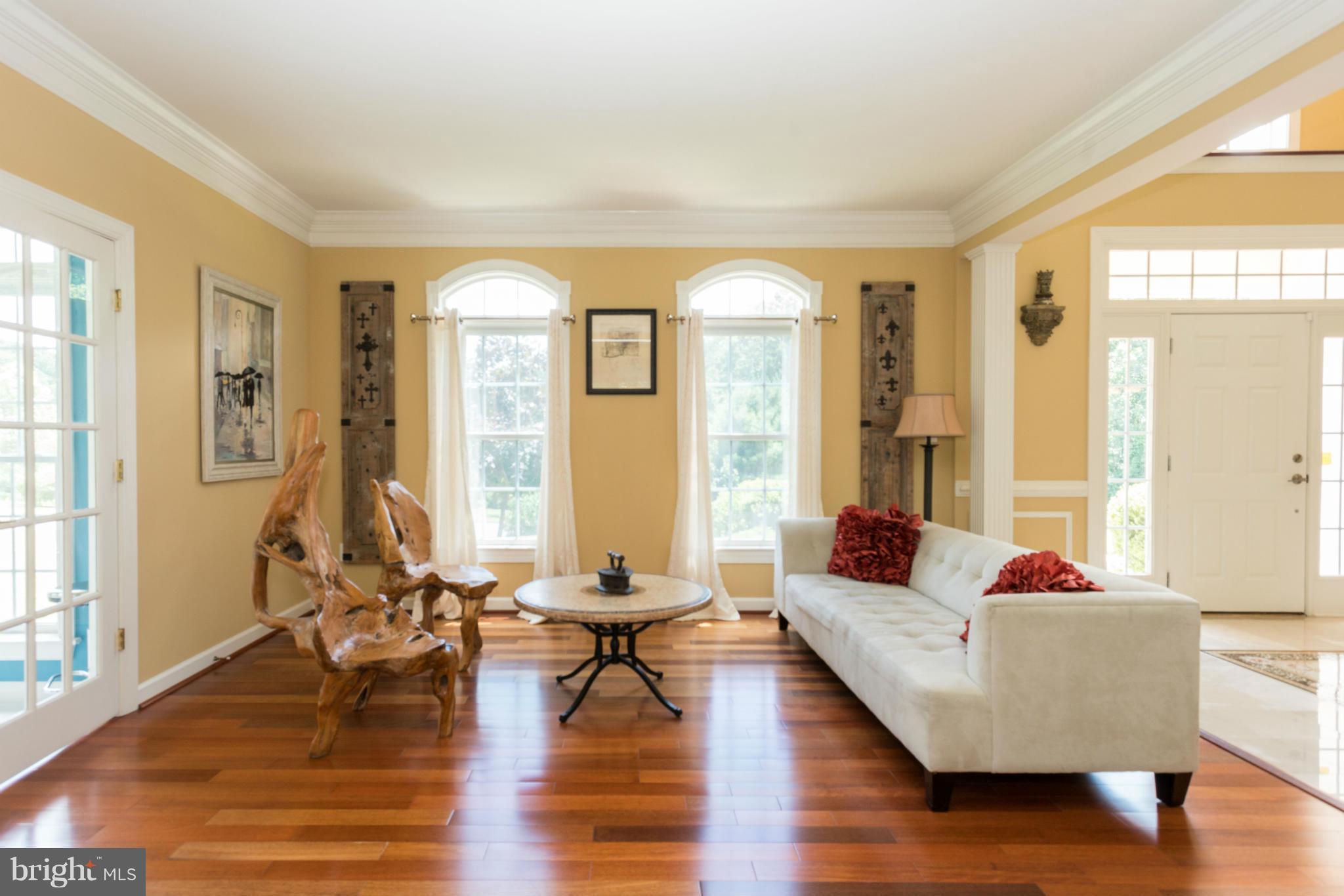 2302 Parlor Court Fallston, MD 21047 - Photo 3 of 30 a living room with furniture and floor to ceiling windows