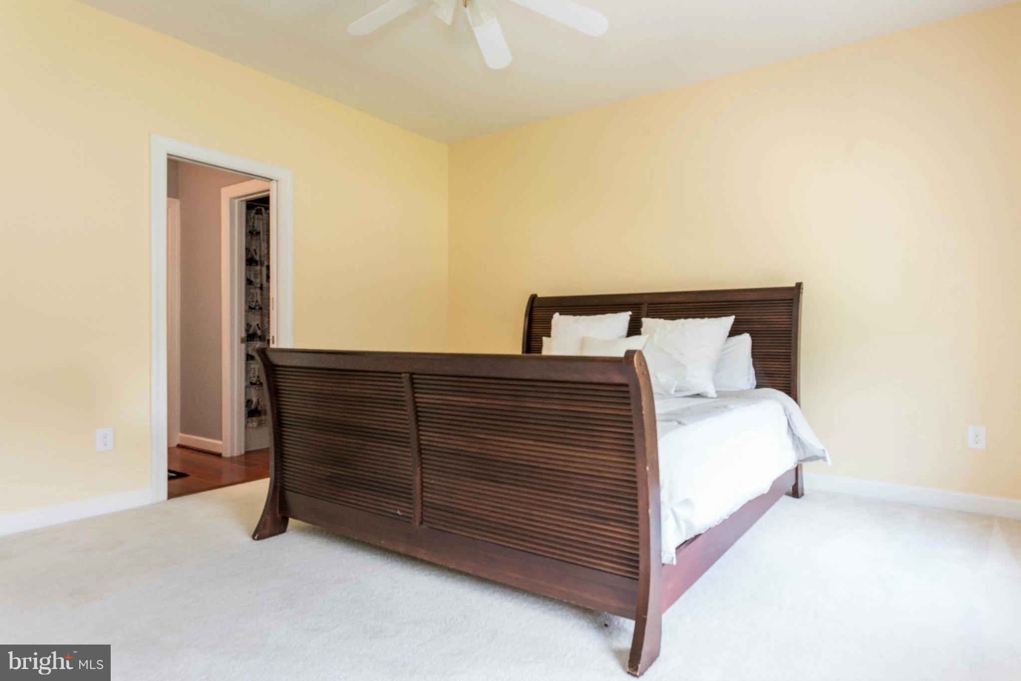 2302 Parlor Court Fallston, MD 21047 - Photo 25 of 30 a bedroom with a bed and cabinet