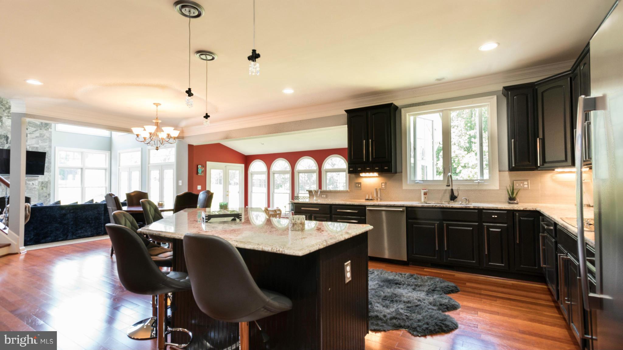 2302 Parlor Court Fallston, MD 21047 - Photo 8 of 30 a large kitchen with lots of counter space dining table and chairs