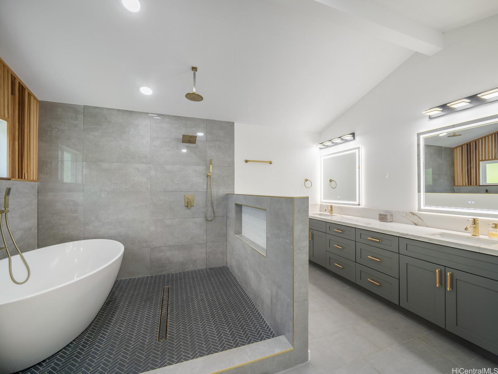 6815 Niumalu Loop Honolulu, HI 96825 - Photo 21 of 25 Dual Vanities, separate tub and shower, high ceilings and plenty of counter and storage space make this expansive Primary Suite Bathroom very special