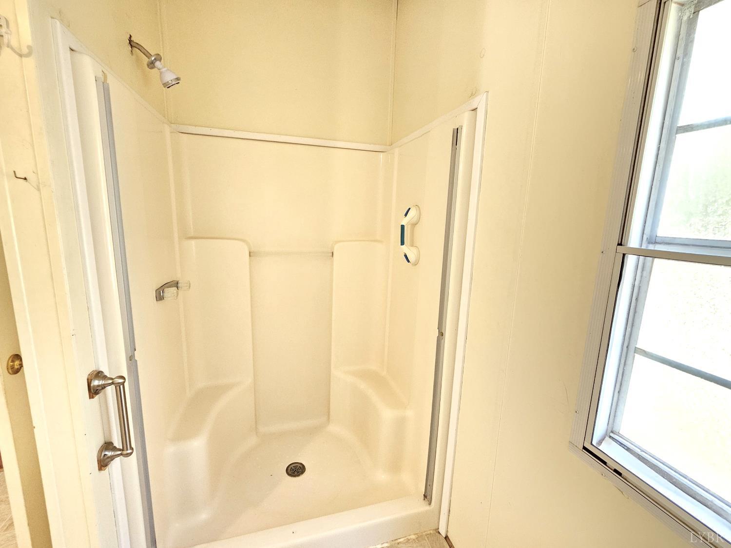 7962 Five Forks Road Farmville, VA 23901 - Photo 17 of 29 a bathroom with a shower and a tub