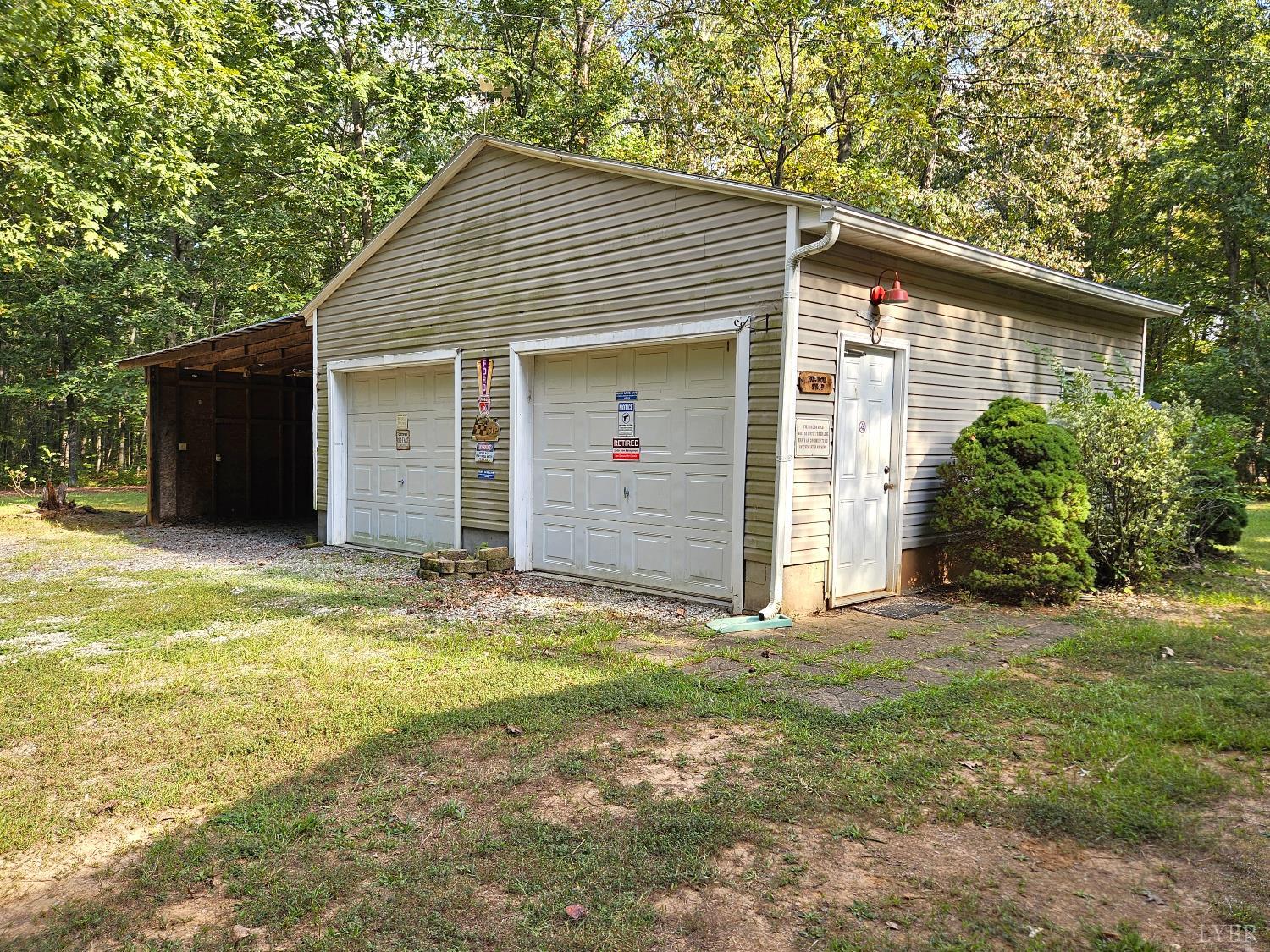 7962 Five Forks Road Farmville, VA 23901 - Photo 20 of 29 a view of a house with backyard and trees