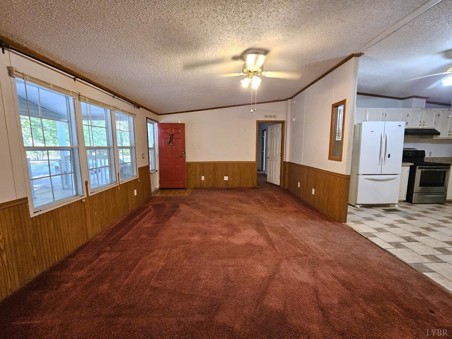 7962 Five Forks Road Farmville, VA 23901 - Photo 7 of 29 a view of a kitchen with a stove and cabinets