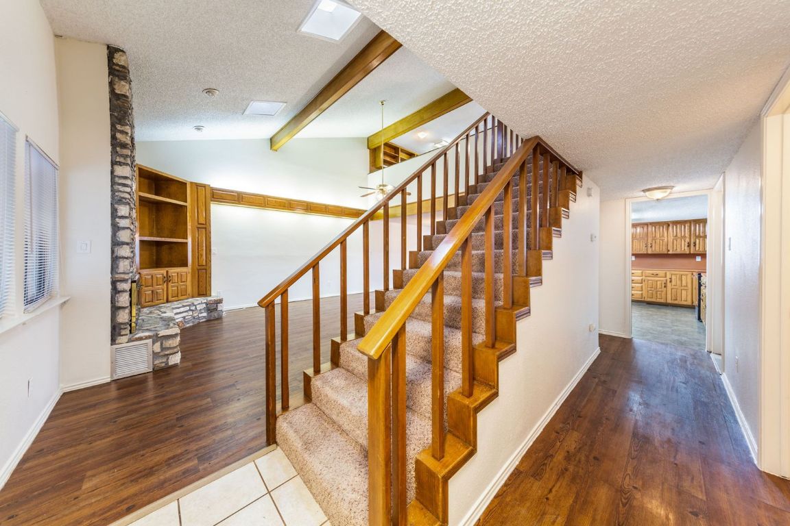 8501 Fathom Circle, Unit A Austin, TX 78750 - Photo 5 of 30 a view of entryway and hall with wooden floor