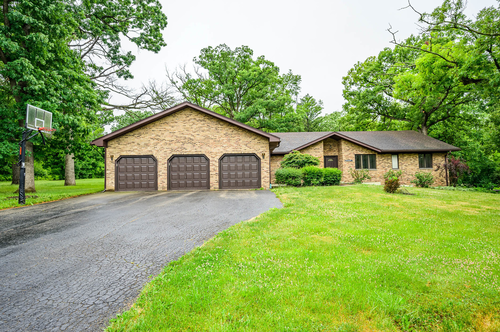 4513 Ripon Road Crystal Lake, IL 60012 - Photo 1 of 17 a front view of a house with yard and green space