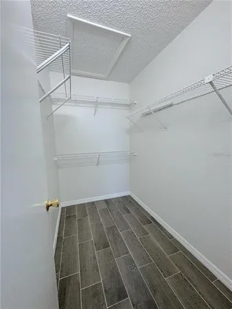 a view of a room with racks on the wall