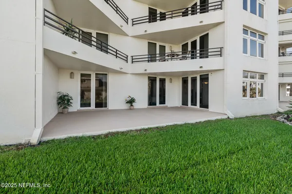 a view of a swimming pool with a lounge chairs