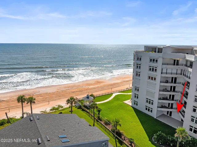a view of a balcony with an ocean view