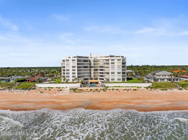 a view of city with ocean