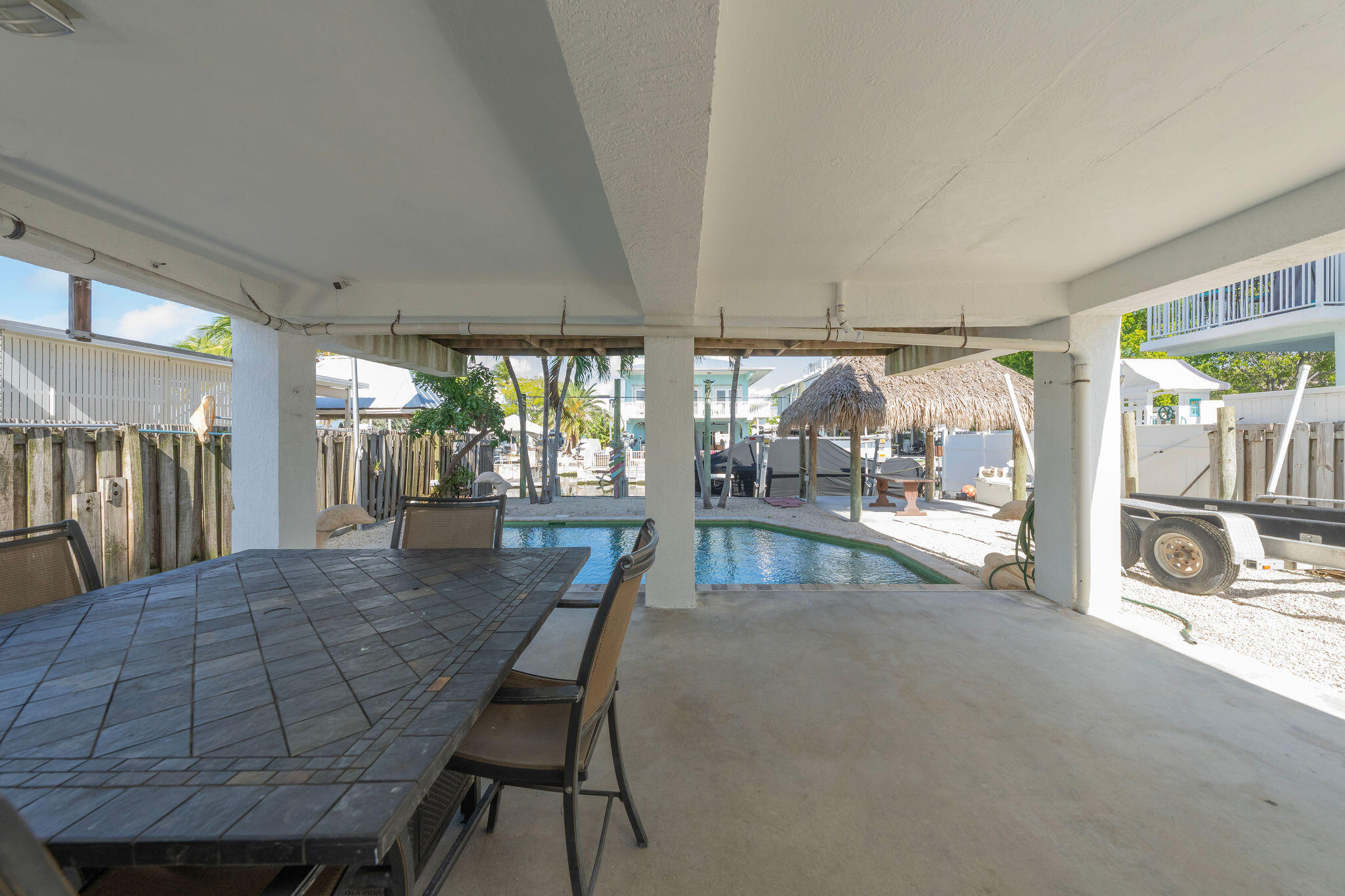 27 Avenue D Key Largo, FL 33037 - Photo 19 of 69 a dining room with furniture and a large window