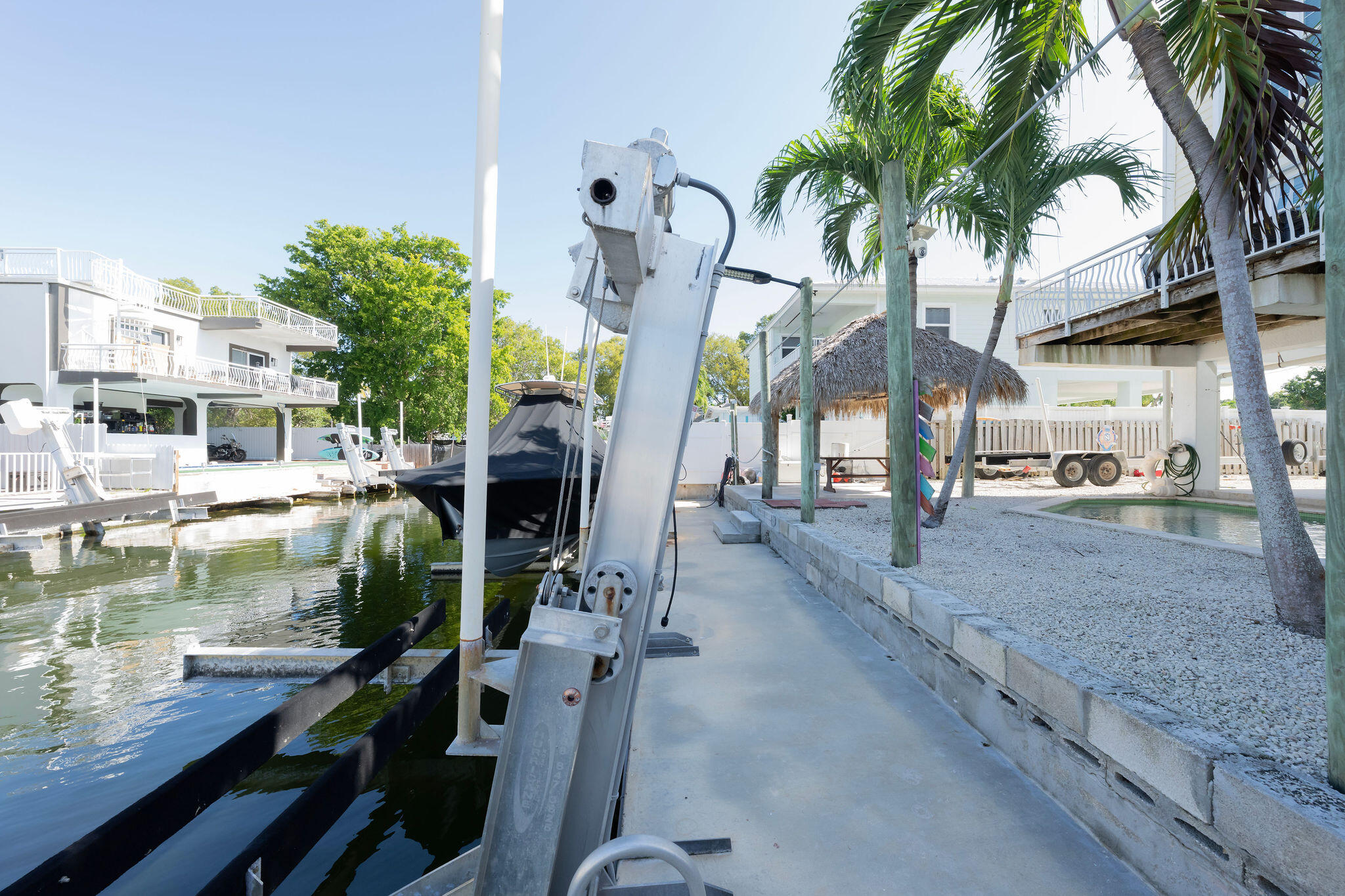 27 Avenue D Key Largo, FL 33037 - Photo 24 of 69 a view of a swimming pool with a patio