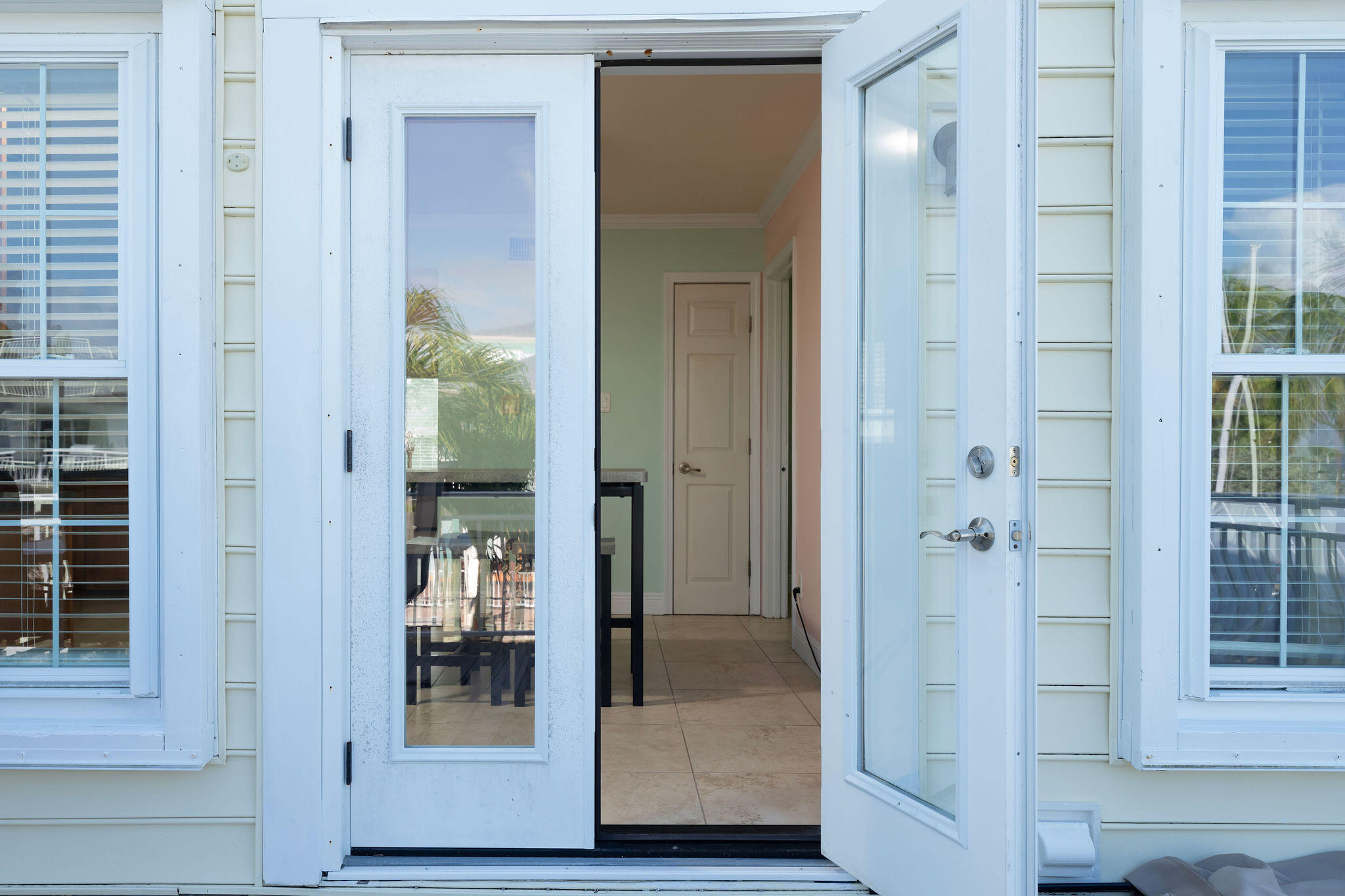 27 Avenue D Key Largo, FL 33037 - Photo 35 of 69 a view of a bathroom from a hallway