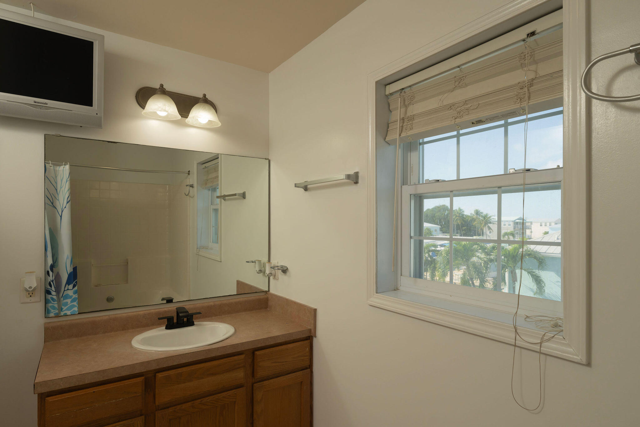 27 Avenue D Key Largo, FL 33037 - Photo 54 of 69 a bathroom with a sink and a mirror
