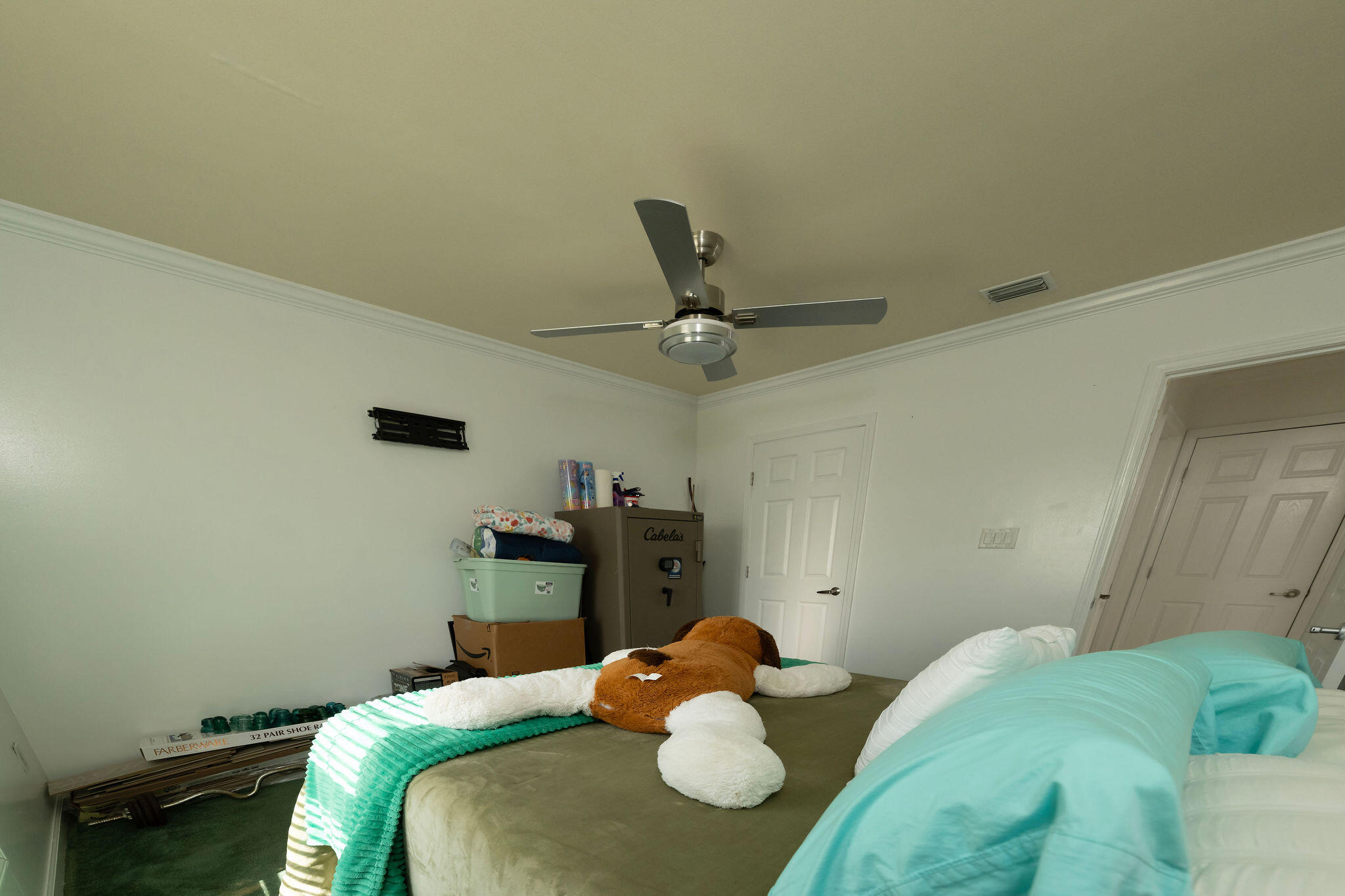 27 Avenue D Key Largo, FL 33037 - Photo 55 of 69 a bedroom with a bed and a chandelier