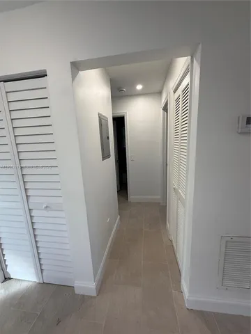 a view of hallway with stairs