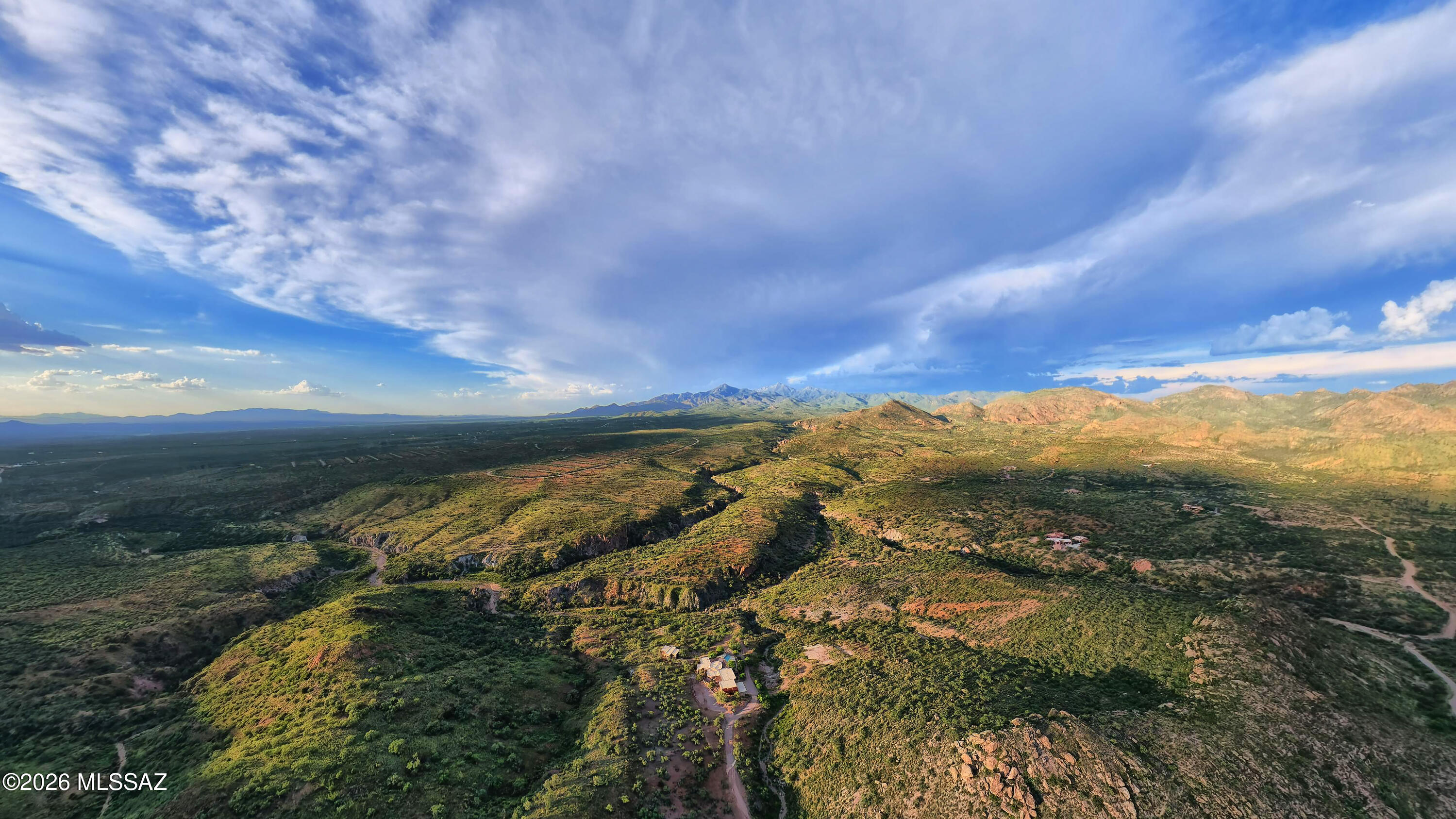 150 Canyon Pass Court Rio Rico, AZ 85648 - Photo 46 of 52 Drone with a big sky