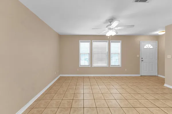a view of an empty room and window