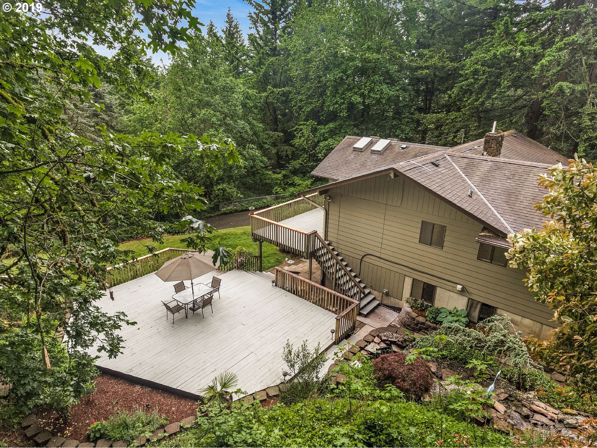 13925 Southeast Wiese Road Damascus, OR 97089 - Photo 4 of 32 an aerial view of a house with yard