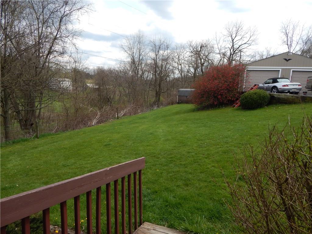 478 Myers Road Eighty Four, PA 15330 - Photo 4 of 18 Generous sized side yard below the driveway and garage area, accessible from side deck.