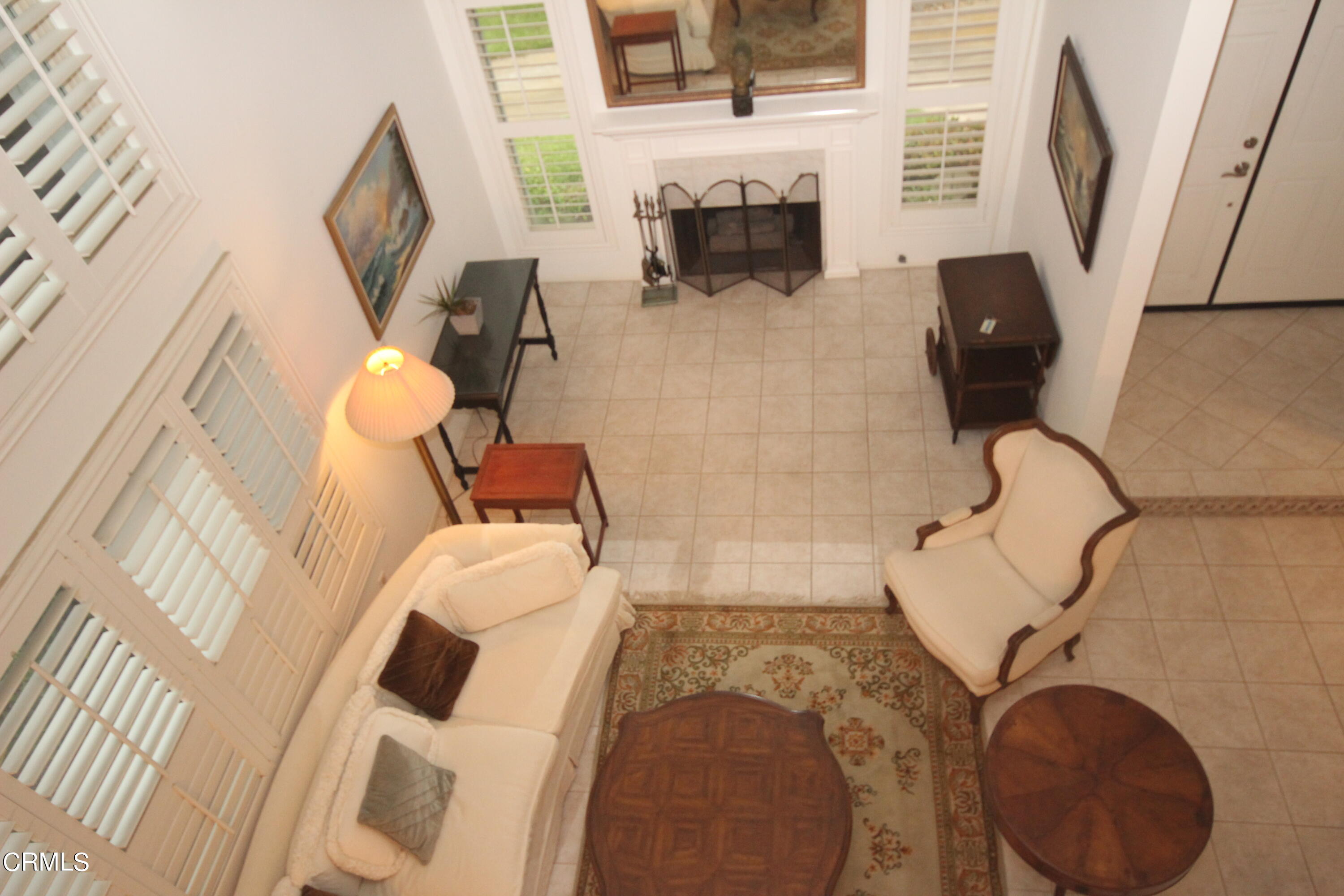 3354 Sunset Lane Oxnard, CA 93035 - Photo 11 of 12 a living room with furniture and a fireplace