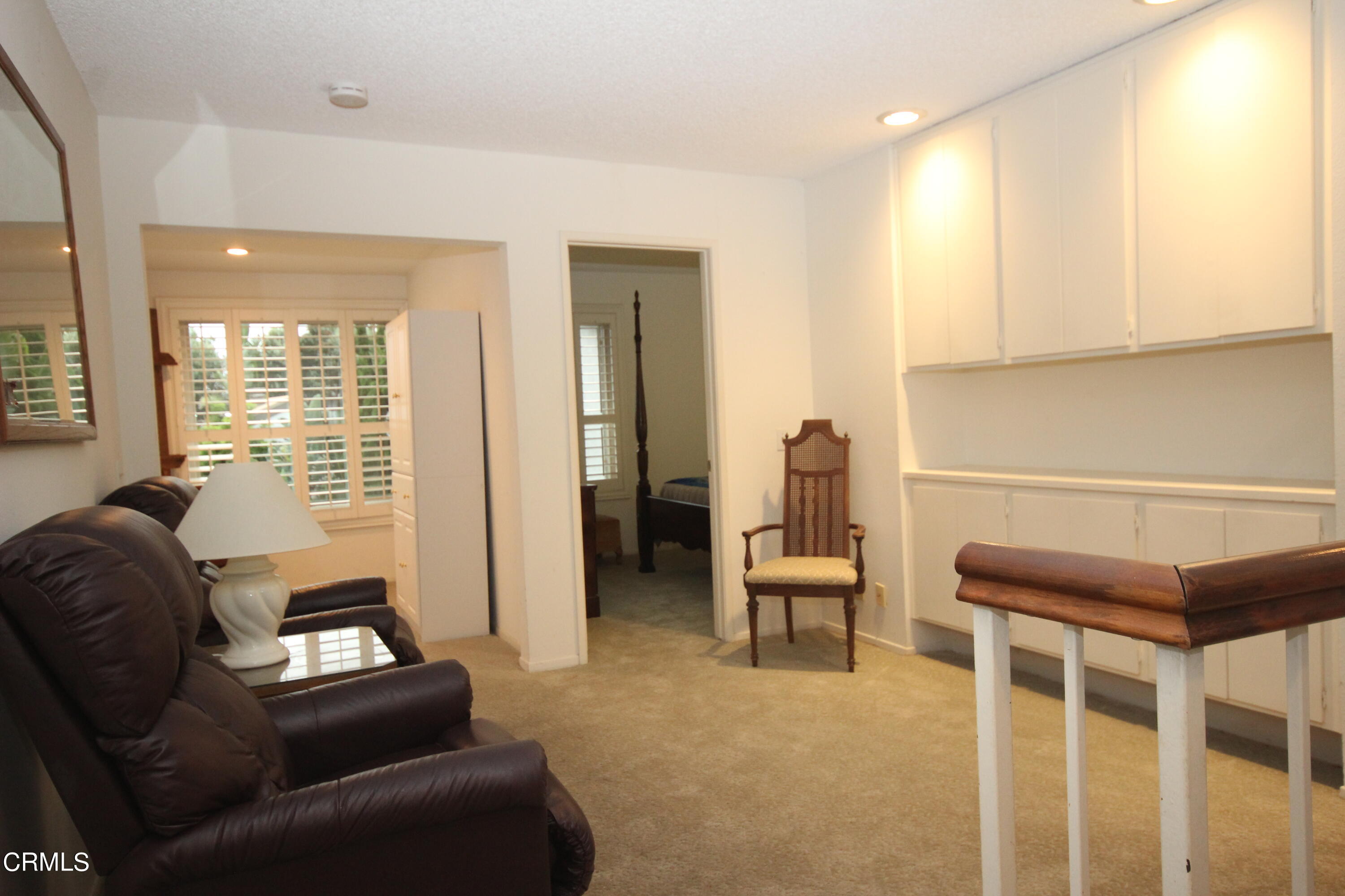 3354 Sunset Lane Oxnard, CA 93035 - Photo 9 of 12 a living room with furniture and a window