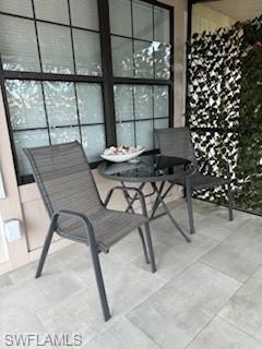 5322 Treetops Drive, Unit I Naples, FL 34113 - Photo 18 of 18 a dining room with furniture and window