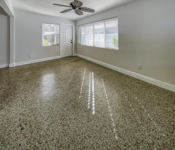 an empty room with windows