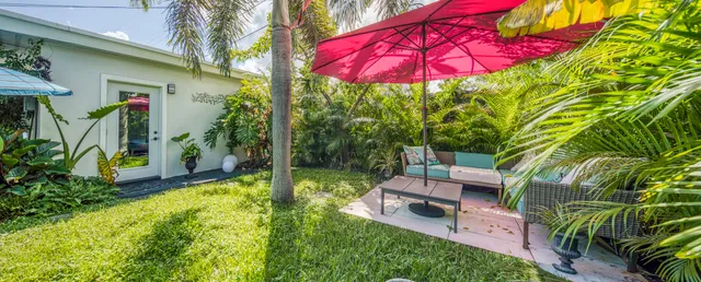 a room with furniture and wooden floor