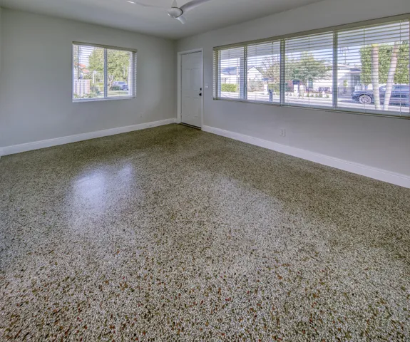 an empty room with windows