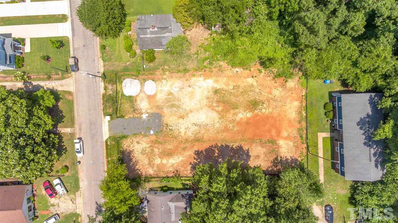 1027 Gregg Street Raleigh, NC 27601 - Photo 6 of 29 an aerial view of residential houses with trees