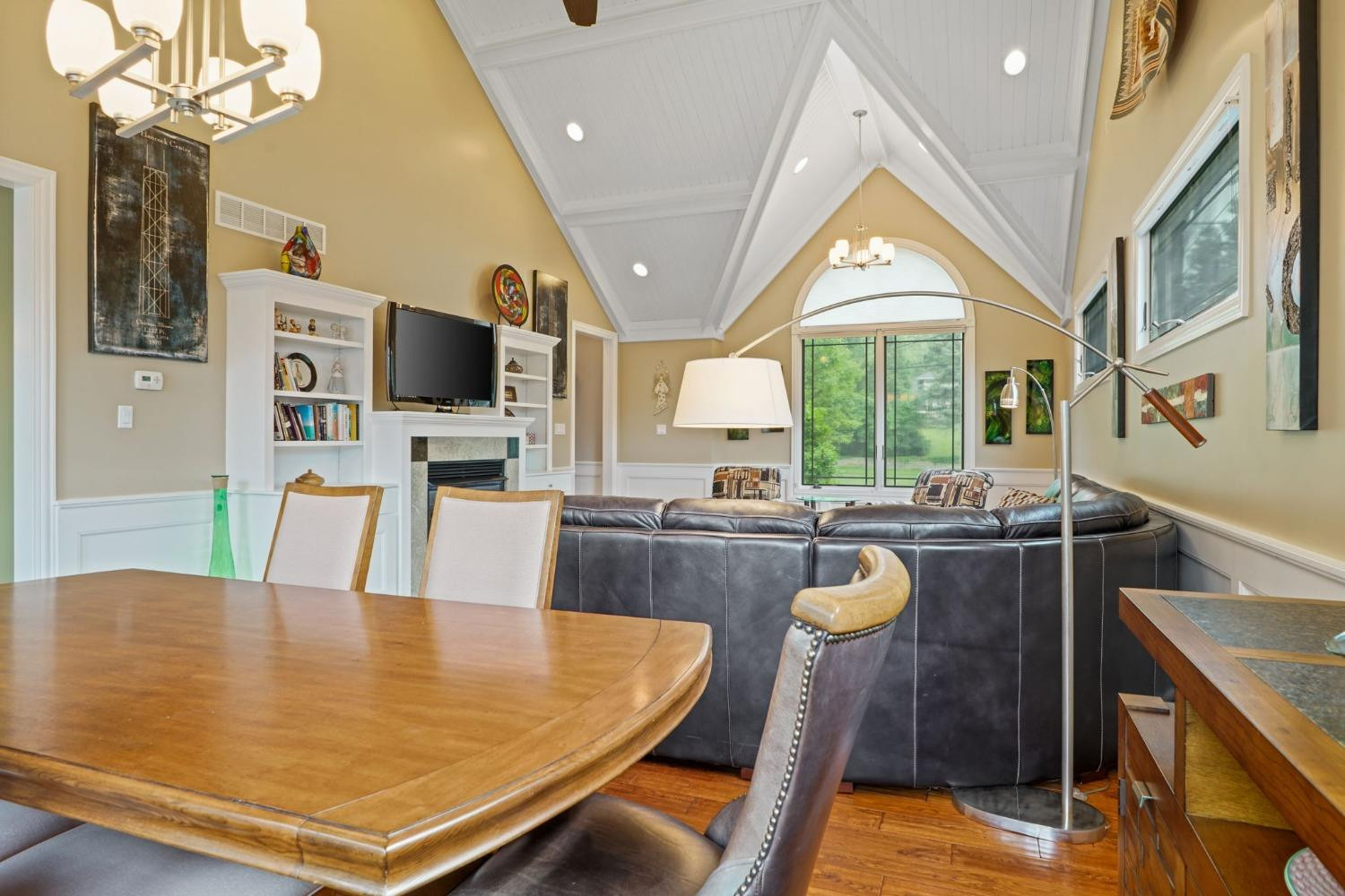 1435 Ridge Road Munster, IN 46321 - Photo 18 of 63 a living room with fireplace furniture and a flat screen tv