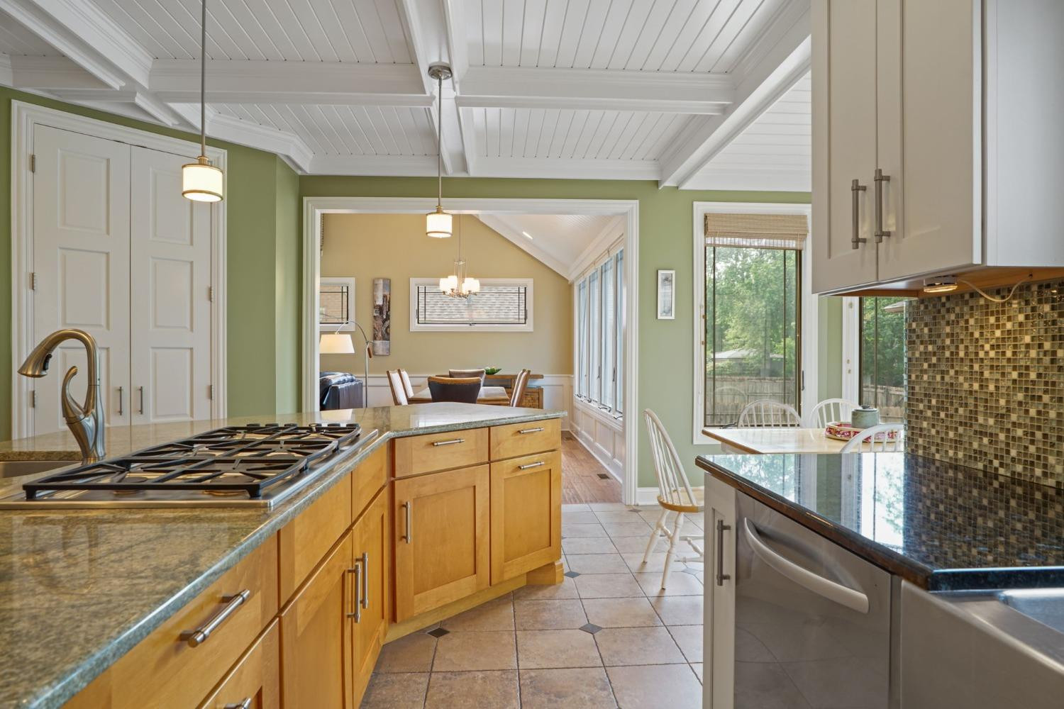 1435 Ridge Road Munster, IN 46321 - Photo 23 of 63 a kitchen with stainless steel appliances granite countertop a sink a stove and a refrigerator