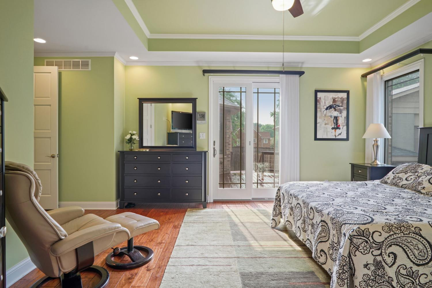 1435 Ridge Road Munster, IN 46321 - Photo 25 of 63 a bedroom with a bed and a dresser