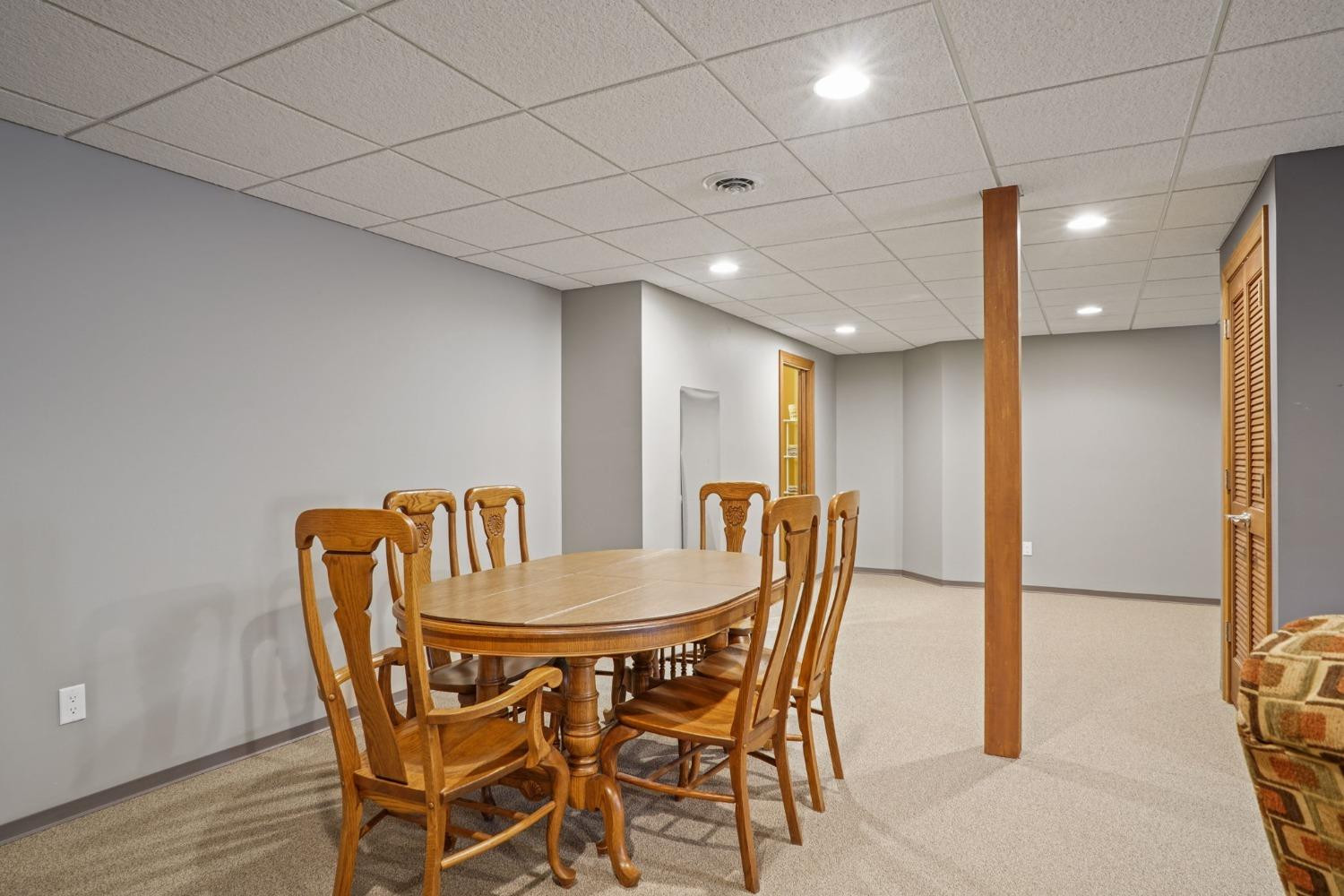 1435 Ridge Road Munster, IN 46321 - Photo 37 of 63 a dining room with furniture and wooden floor
