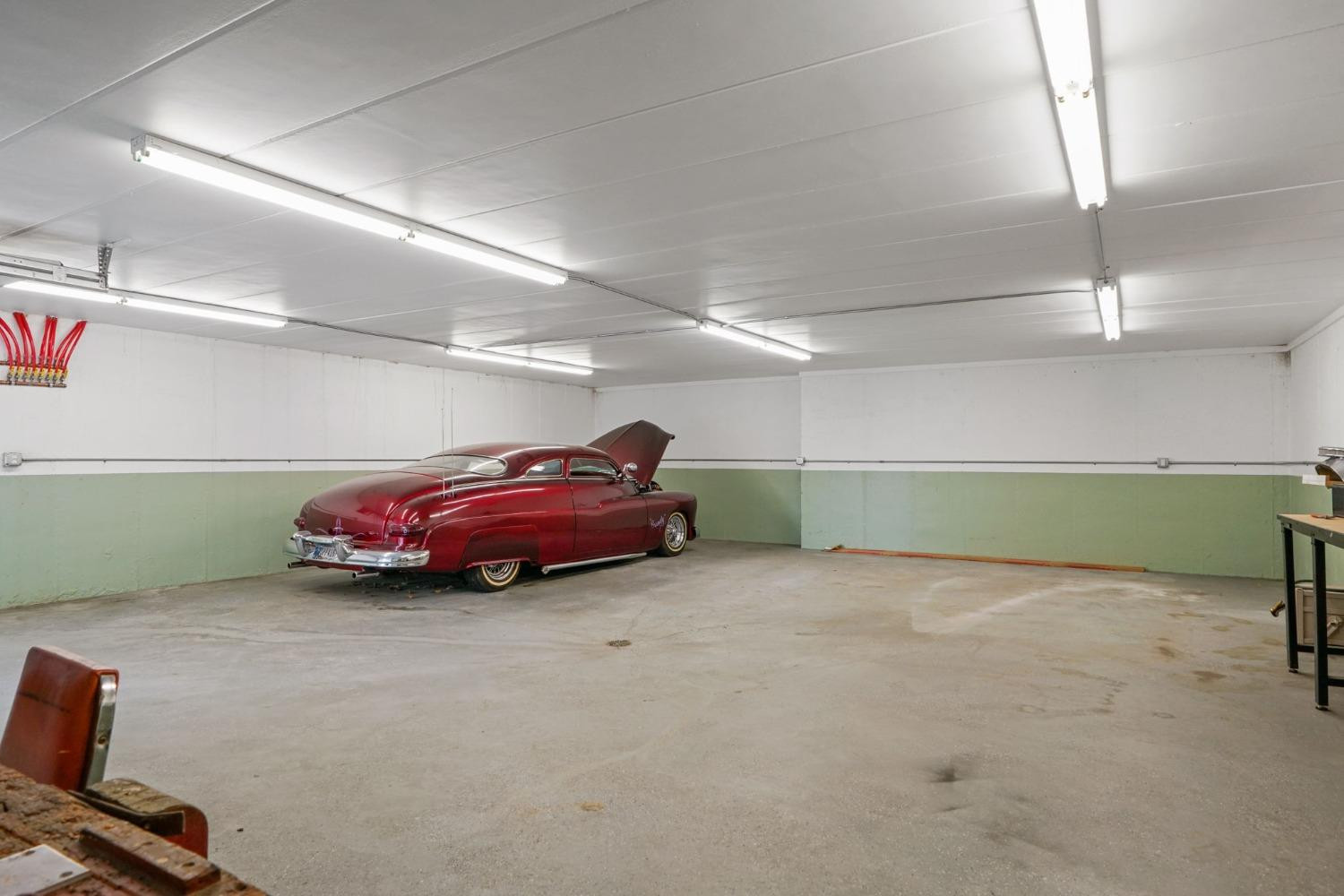 1435 Ridge Road Munster, IN 46321 - Photo 40 of 63 a car parked in a parking garage