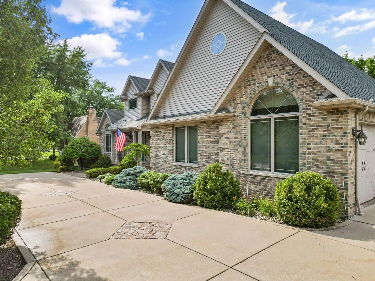 1435 Ridge Road Munster, IN 46321 - Photo 4 of 63 front view of a house and a yard