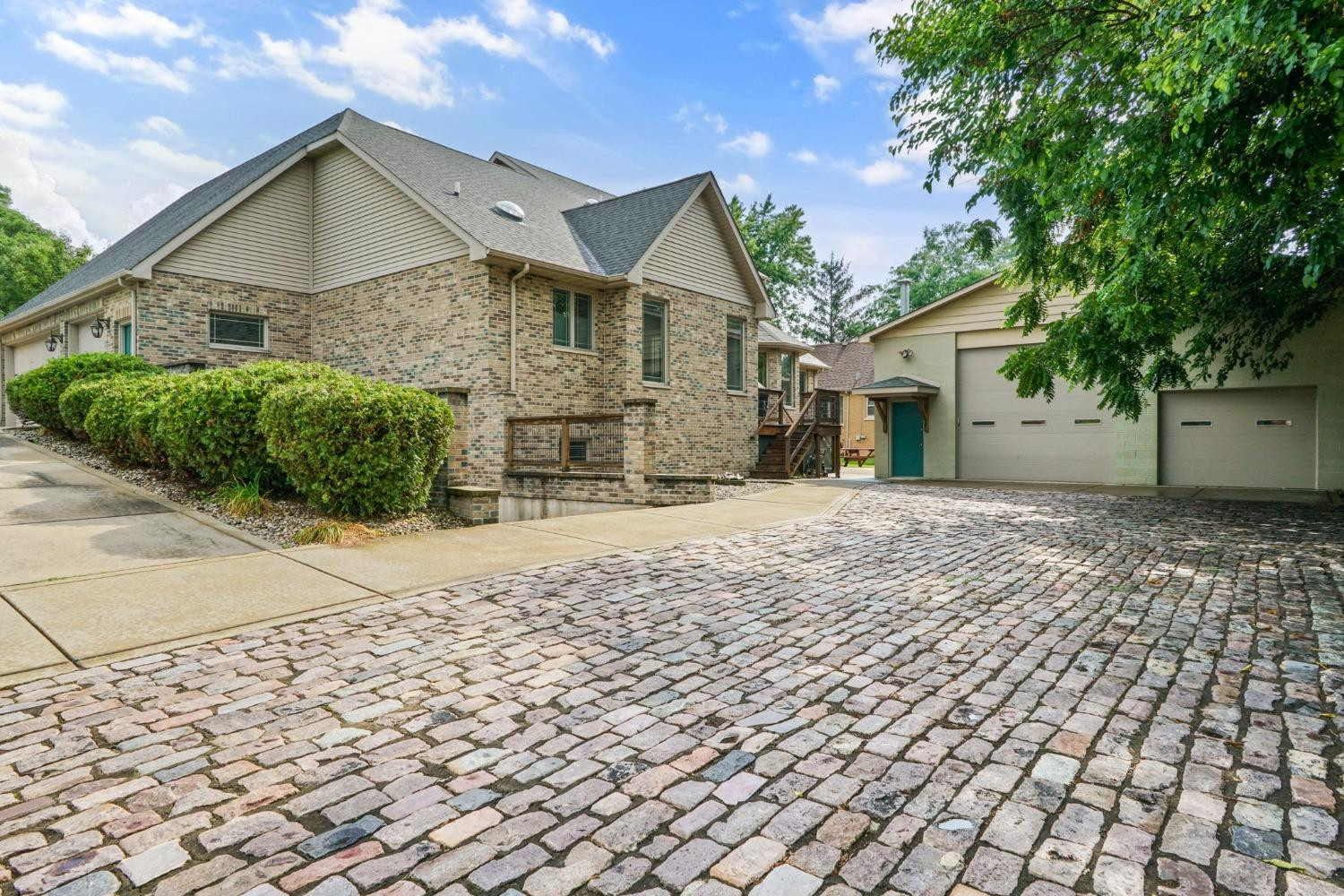 1435 Ridge Road Munster, IN 46321 - Photo 48 of 63 a front view of a house with a yard and garage