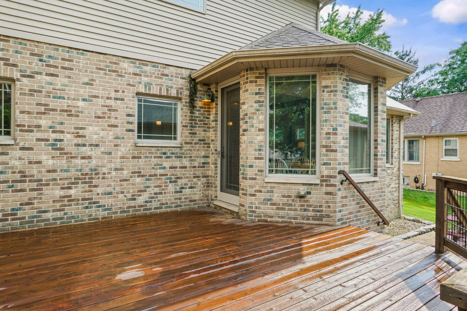 1435 Ridge Road Munster, IN 46321 - Photo 52 of 63 a view of a brick house with wooden floor and staircase