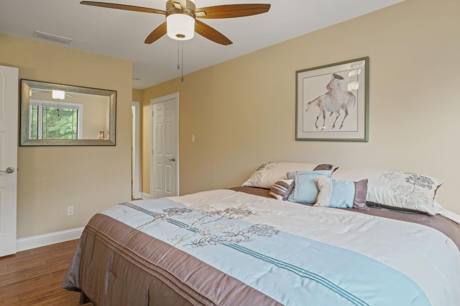 1435 Ridge Road Munster, IN 46321 - Photo 55 of 63 a bedroom with a bed and a painting on the wall