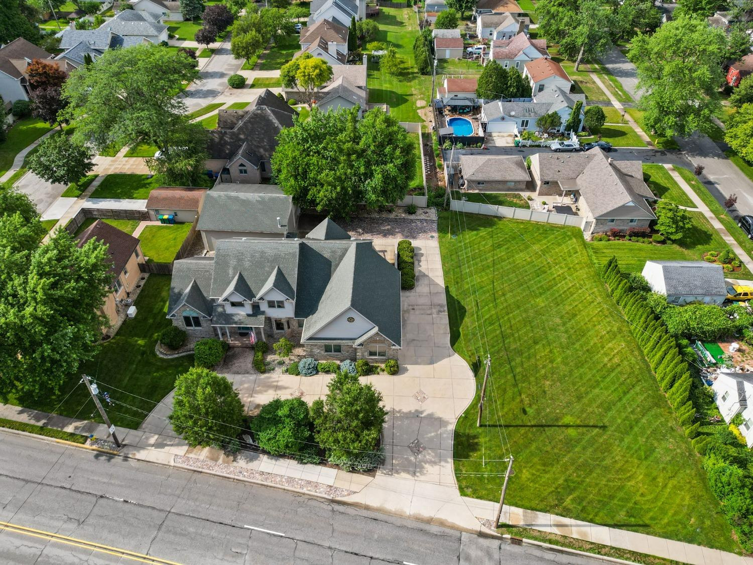 1435 Ridge Road Munster, IN 46321 - Photo 6 of 63 an aerial view of a house with yard swimming pool and outdoor seating