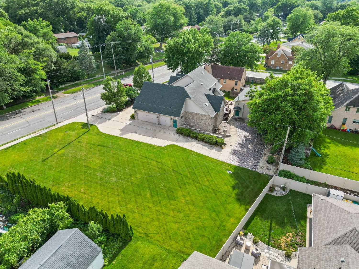 1435 Ridge Road Munster, IN 46321 - Photo 63 of 63 an aerial view of a house with a yard