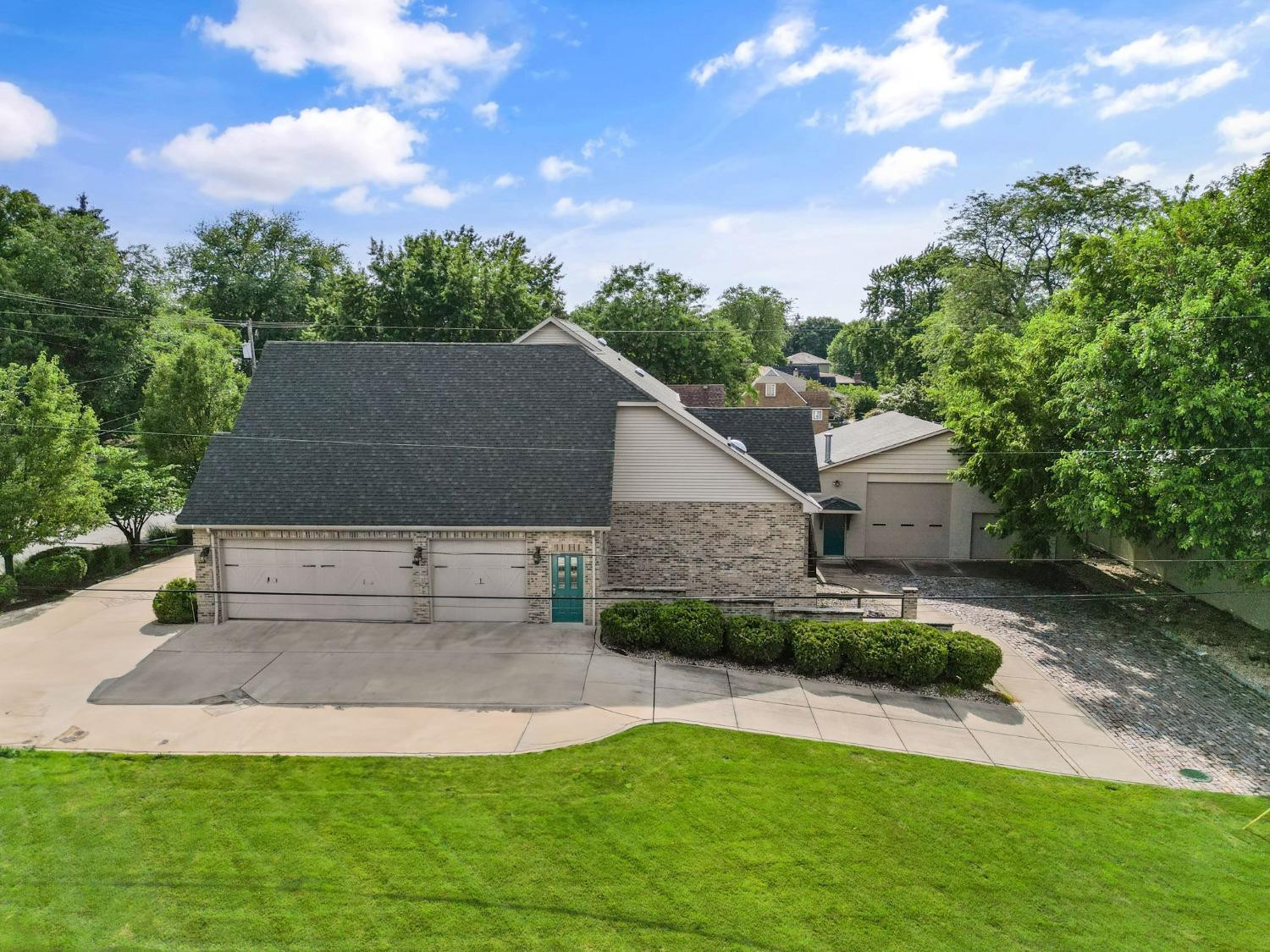 1435 Ridge Road Munster, IN 46321 - Photo 9 of 63 a view of a house with a big yard plants and large trees