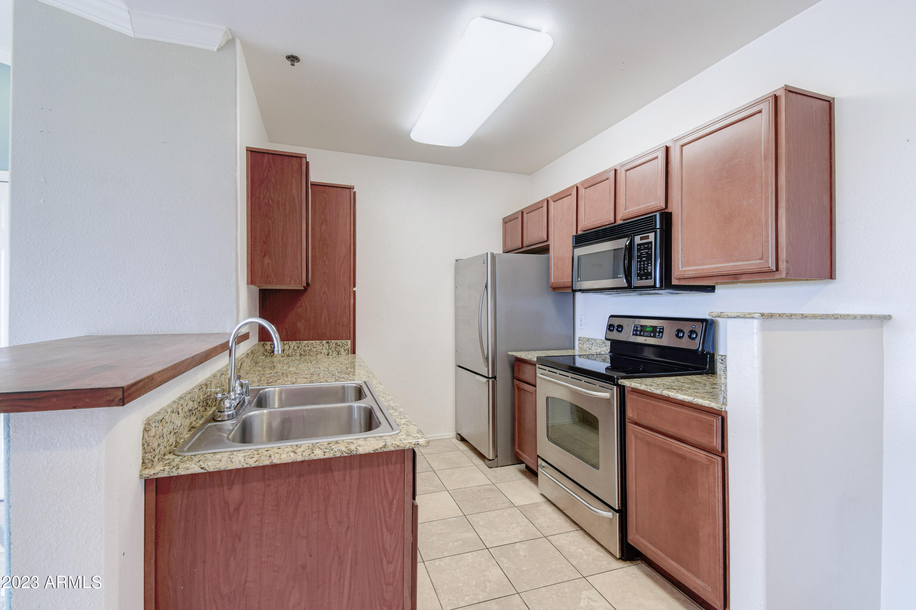 2134 East Broadway Road, Unit 3072 Tempe, AZ 85282 - Photo 8 of 18 Kitchen with Lots of Storage