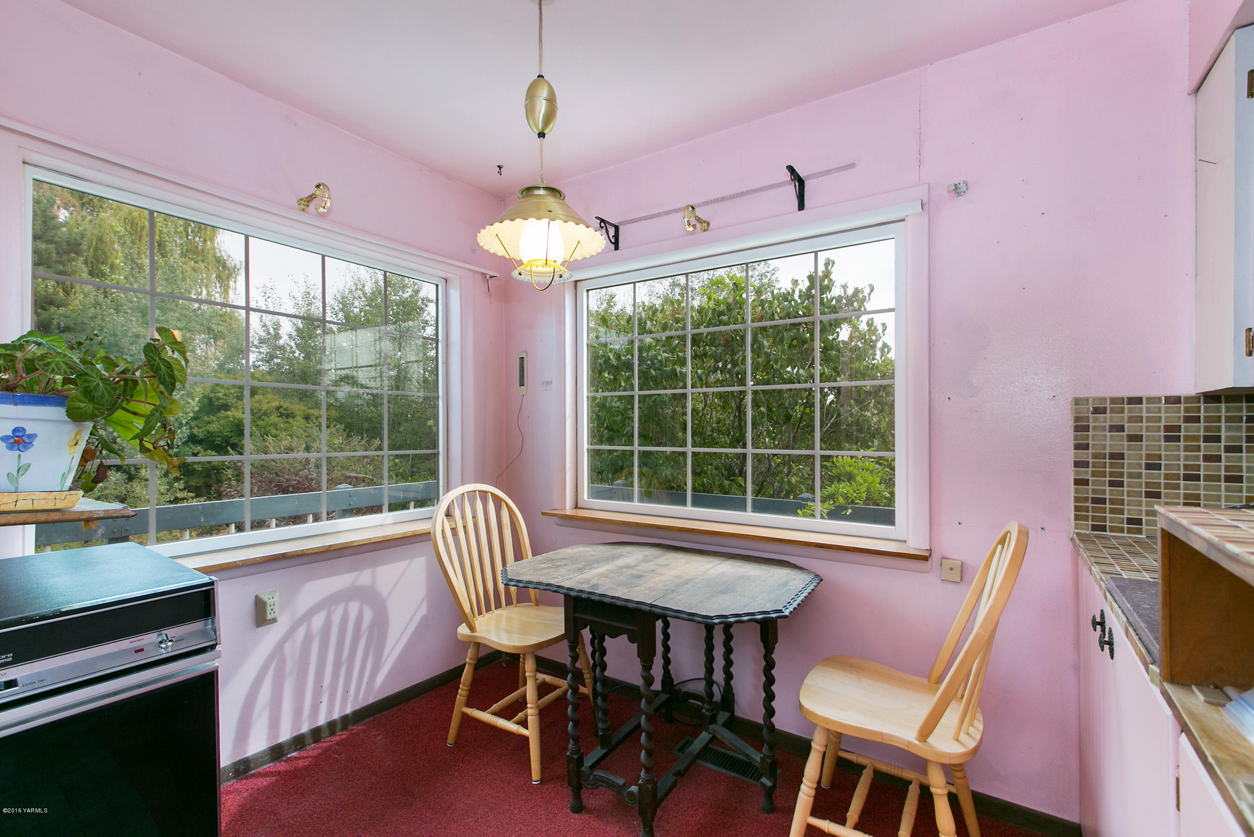 10909 Summitview Ext Road Yakima, WA 98908 - Photo 14 of 20 a view of a dining room with furniture window and outside view